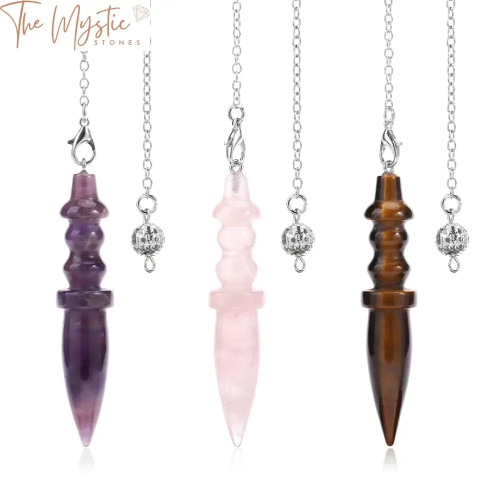 A pink quartz pendulum with a smooth, cone-shaped pendant, accented by a delicate chain and small amethyst crystals.