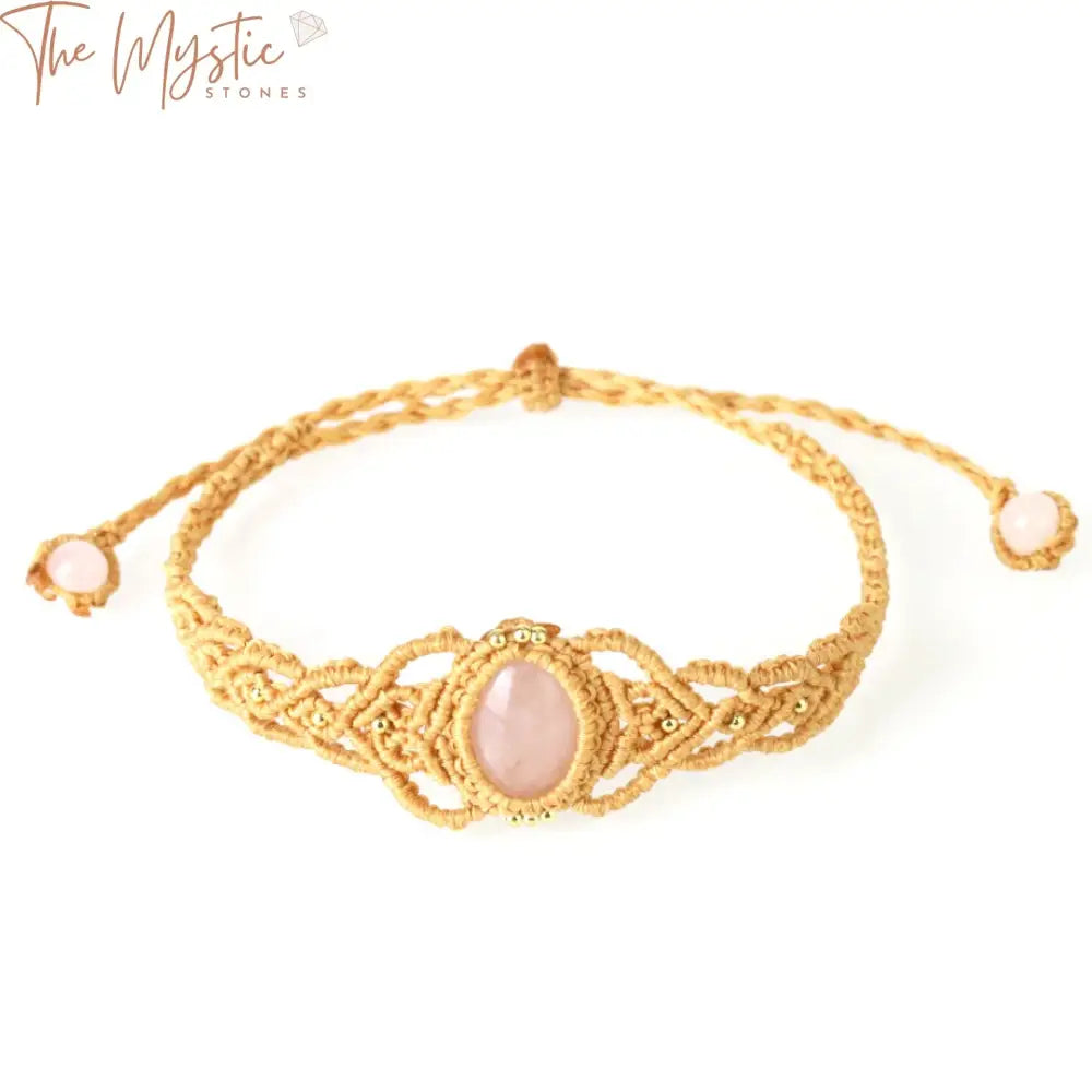 A bracelet featuring an oval pink quartz cabochon set in a braided rope design.