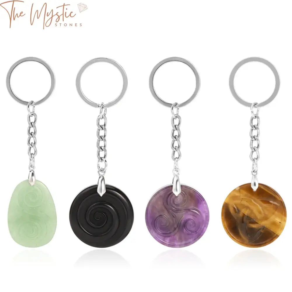 A round natural stone keychain featuring a trendy pink quartz with a 3D carved moon face and star design.