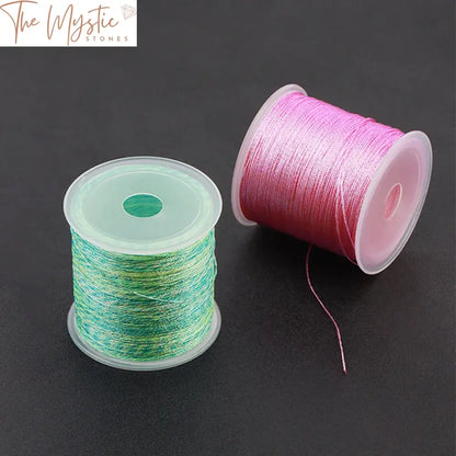 A neatly coiled spool of durable polyamide nylon cord, featuring six strands of vibrant silk thread in a deep, rich hue.