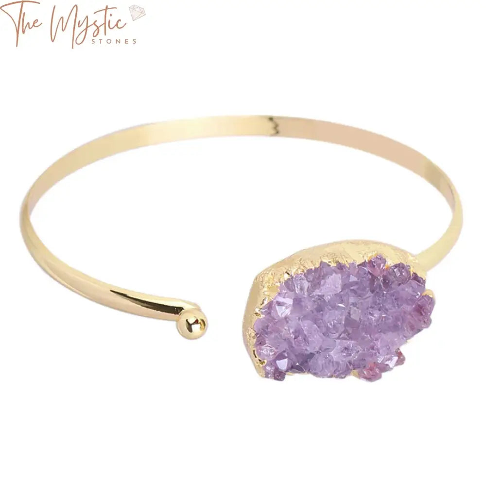 A fashion cuff bracelet featuring a half-open gold band design, adorned with natural stone purple quartz crystals.