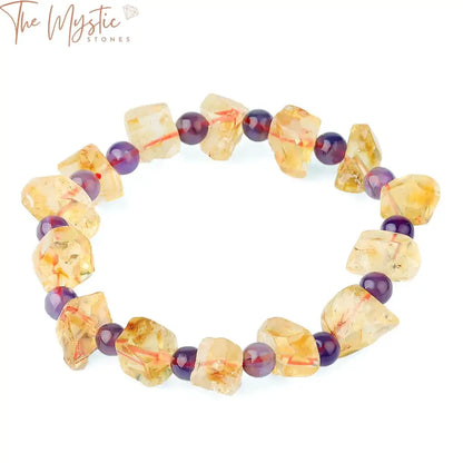 A collection of bracelets displayed, featuring vibrant irregular beads in shades of purple and yellow.