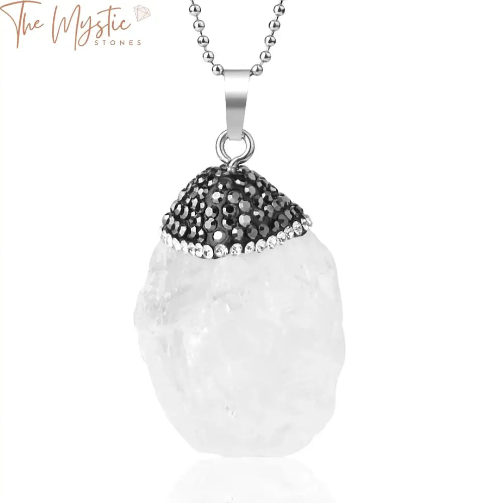 A natural crystal pendant necklace featuring an irregularly shaped clear white rock quartz stone.