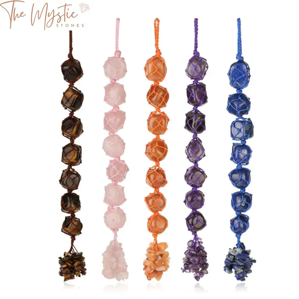 A handcrafted car hanging decoration featuring a tumbled crystal quartz stone intricately wrapped with a braided rope.