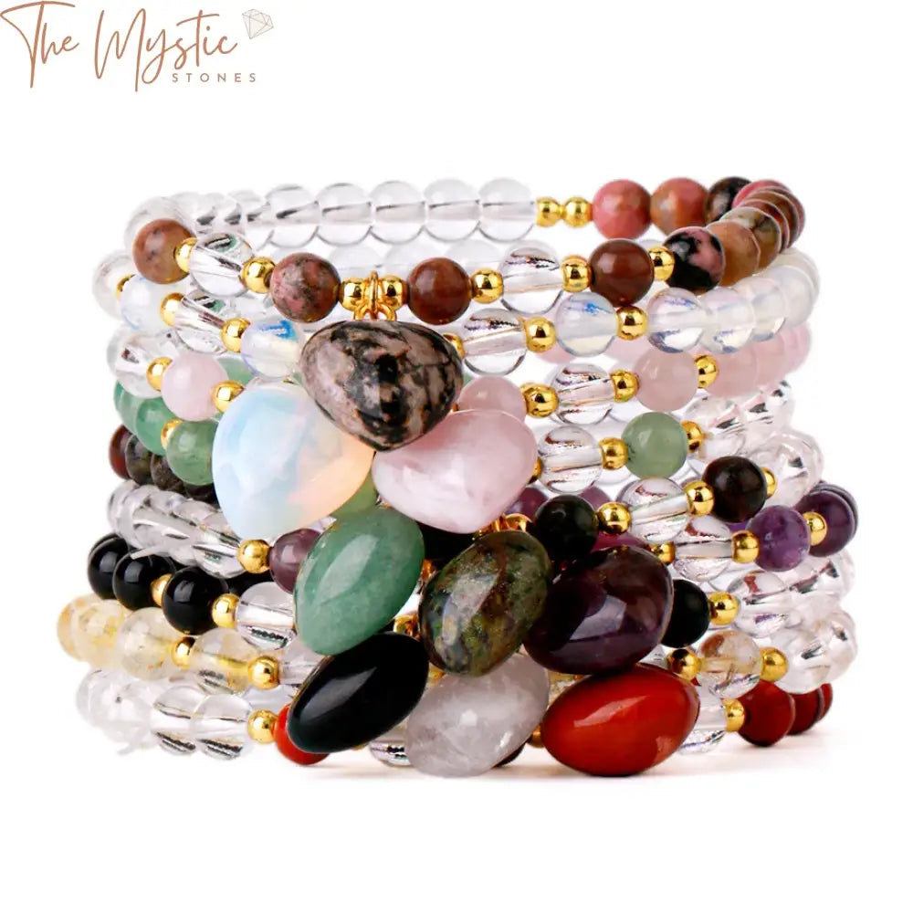 A spiritual crystal bracelet featuring 6mm natural quartz stone beads, adorned with a heart charm.