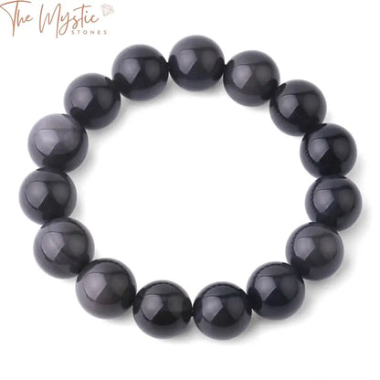 A bracelet made of round beads in varying sizes, featuring natural stone ice rainbow eye obsidian.