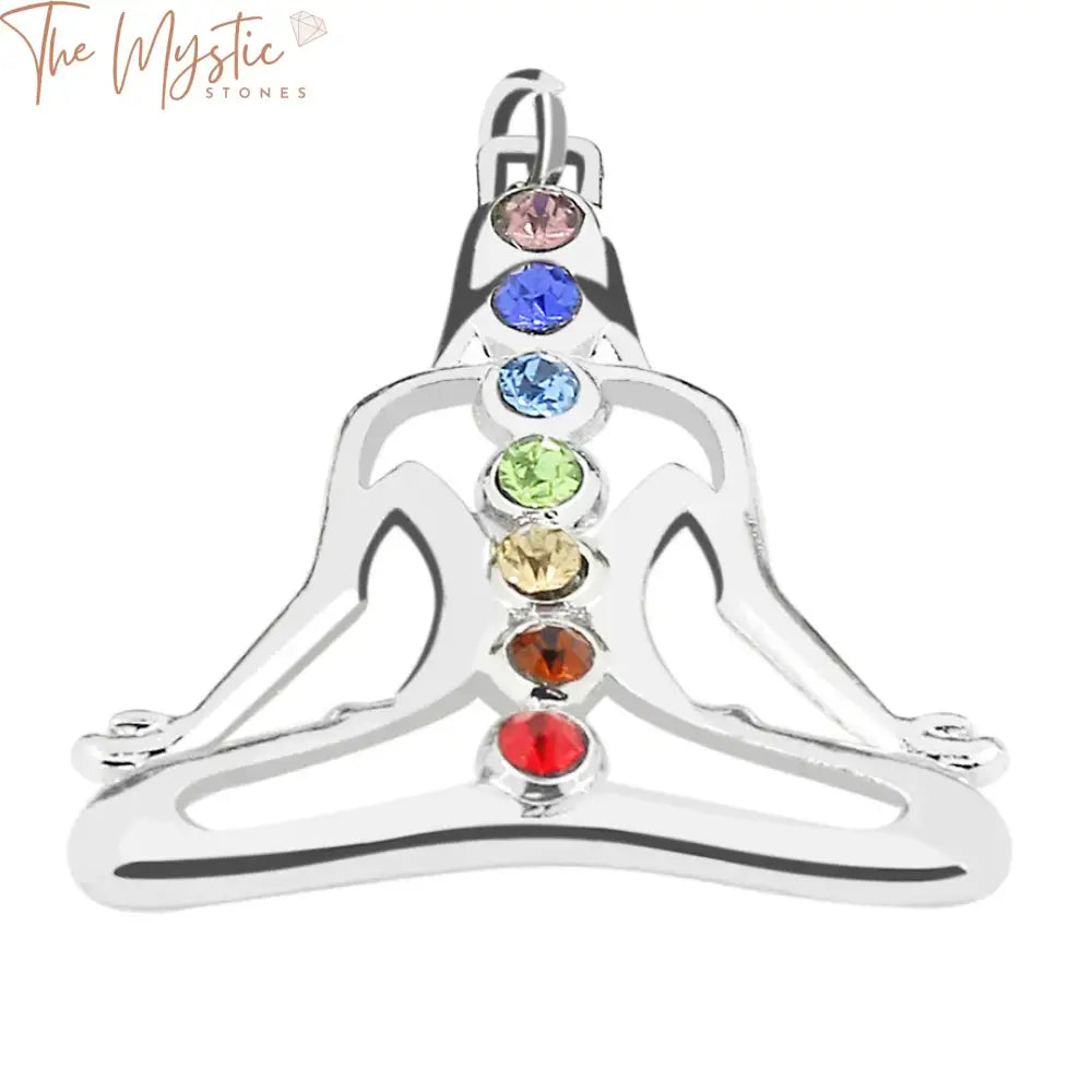 A set of seven colorful pendants featuring rainbow rhinestones, each representing a different chakra with distinct colors.