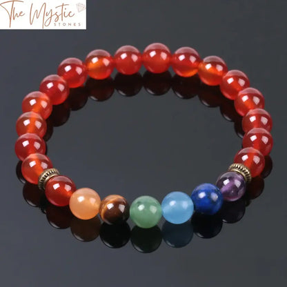 A collection of 7 Chakra Red Onyx bracelets featuring natural crystal stones.