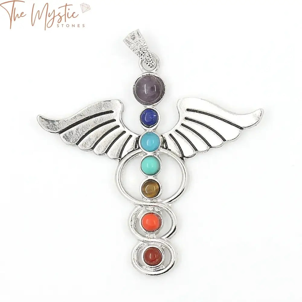 A necklace pendant featuring an angel wing design, adorned with seven chakra-colored natural stone crystals.