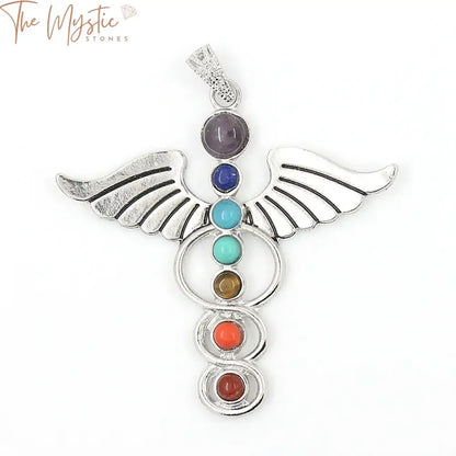 A necklace pendant featuring an angel wing design, adorned with seven chakra-colored natural stone crystals.