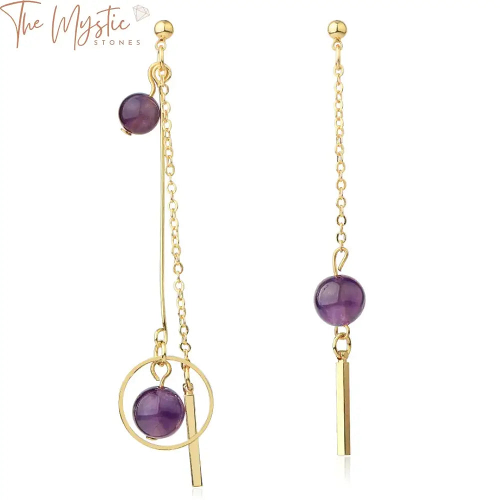 A pair of elegant earrings featuring a gold-color metal chain and tassel design.