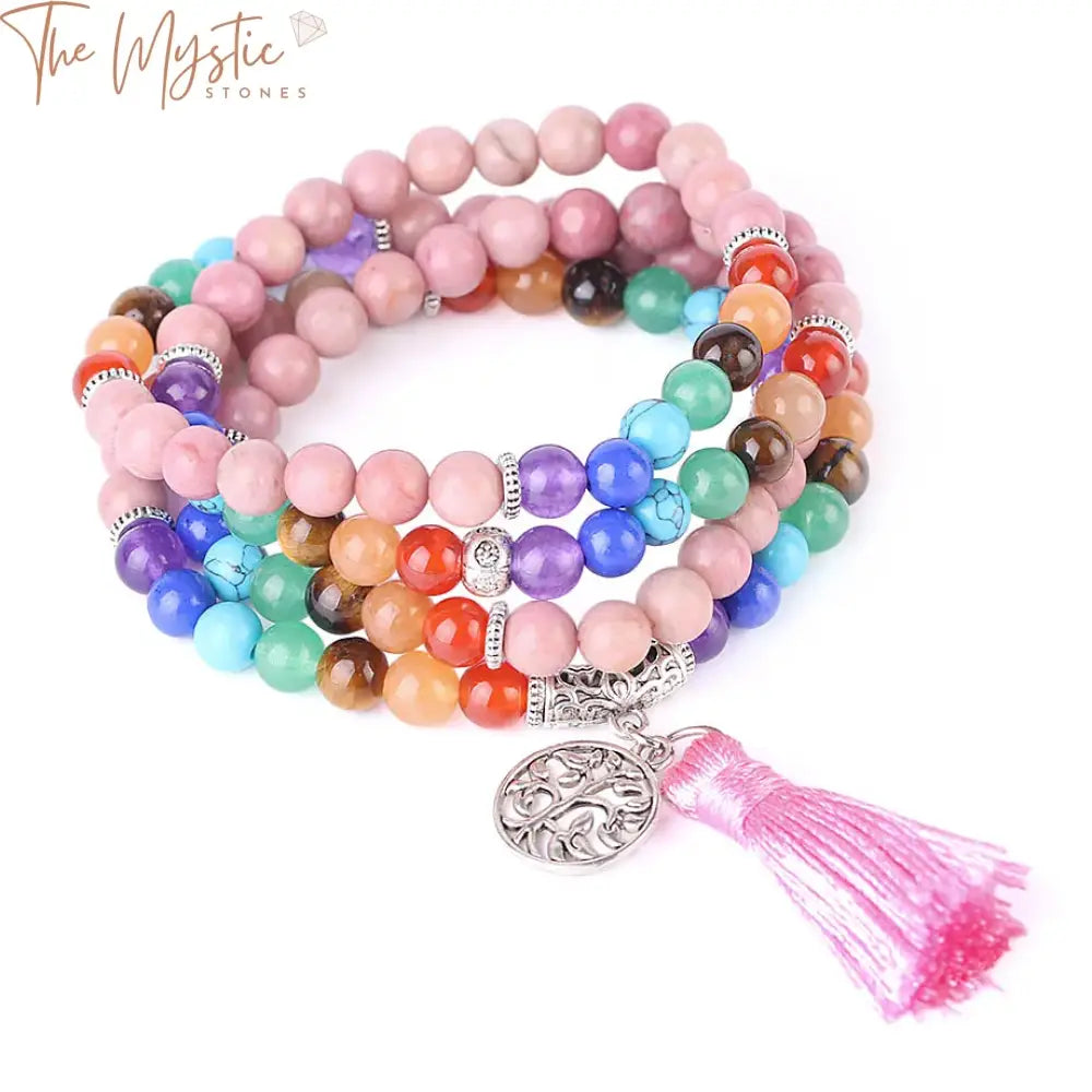 A colorful bracelet made of 108 mala beads, featuring polished rhodonite stones.