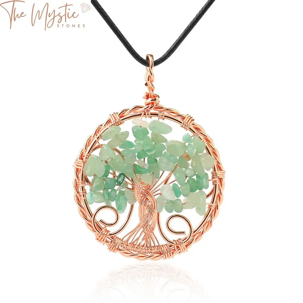 A collection of Tree of Life pendant necklaces featuring natural stone beads in a rose gold-colored wire wrap design.