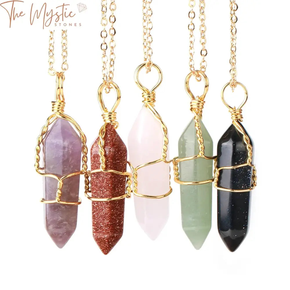 A hexagonal crystal necklace featuring a rose quartz pendant in a healing point shape.