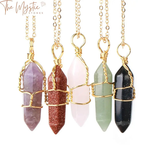 A hexagonal crystal necklace featuring a rose quartz pendant in a healing point shape.