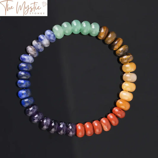 A bracelet featuring an array of natural stones, each representing one of the 7 chakras.