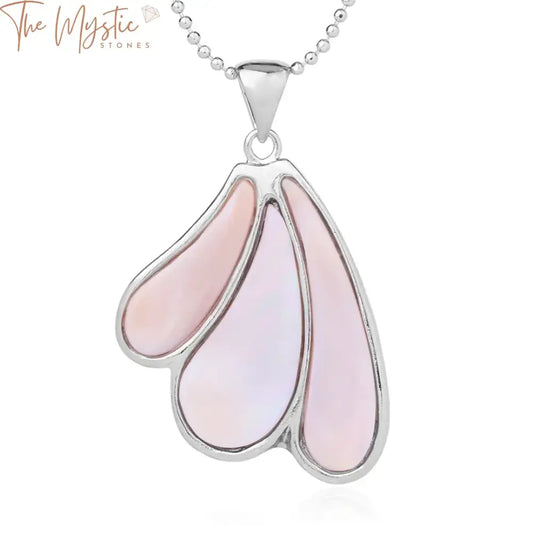 A statement necklace featuring large, glossy pink natural mother of pearl shell pendants.