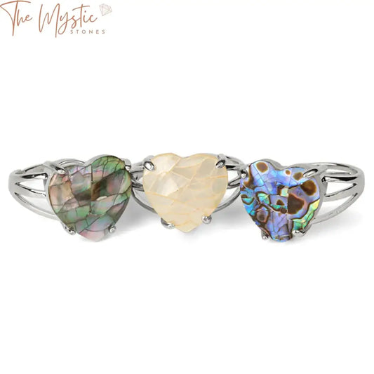 A silver color adjustable ring featuring a heart-shaped natural stone at its center, designed for women.