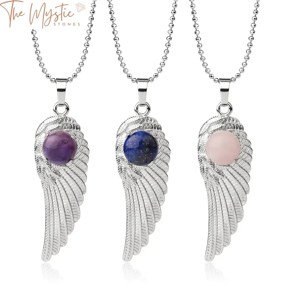 A variety of silver wing pendant necklaces featuring natural stone cabochons.