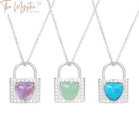 A trendy lock pendant chain necklace styled for men, featuring a heart-shaped crystal made of natural stone.