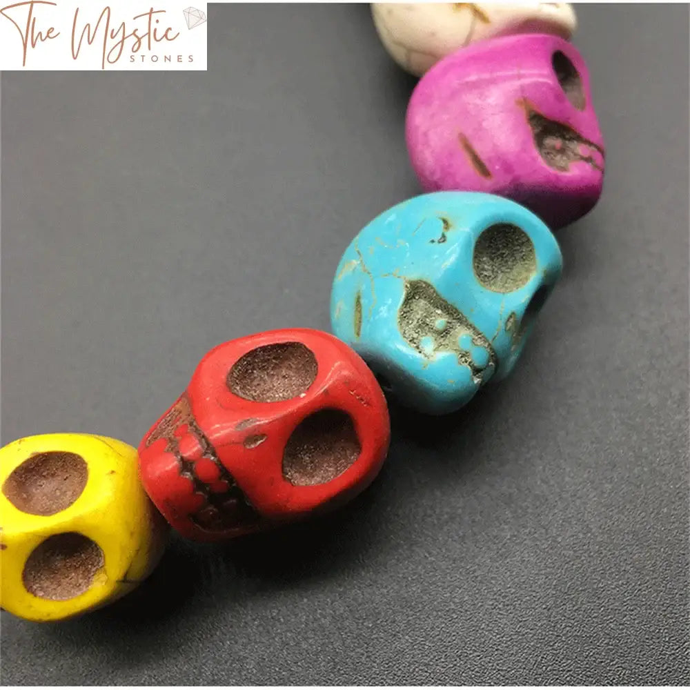 Synthetic Turquoise Carved Skull Beads