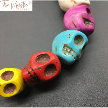 Synthetic Turquoise Carved Skull Beads