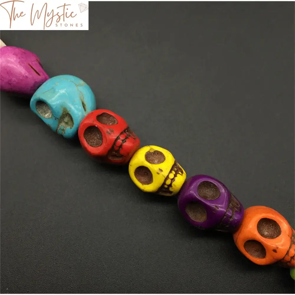 Synthetic Turquoise Carved Skull Beads