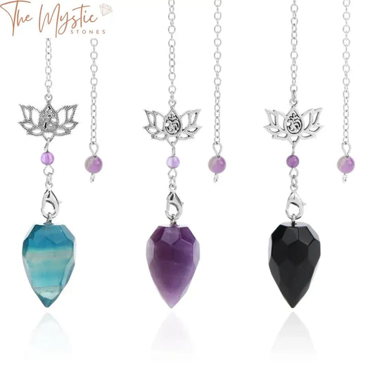 A collection of seven spiritual crystal pendulums is displayed against a plain background.