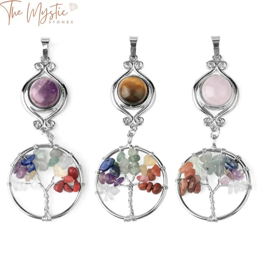 A Tree of Life necklace pendant featuring seven chakra stones in vibrant colors, interwoven into a circular wire frame.