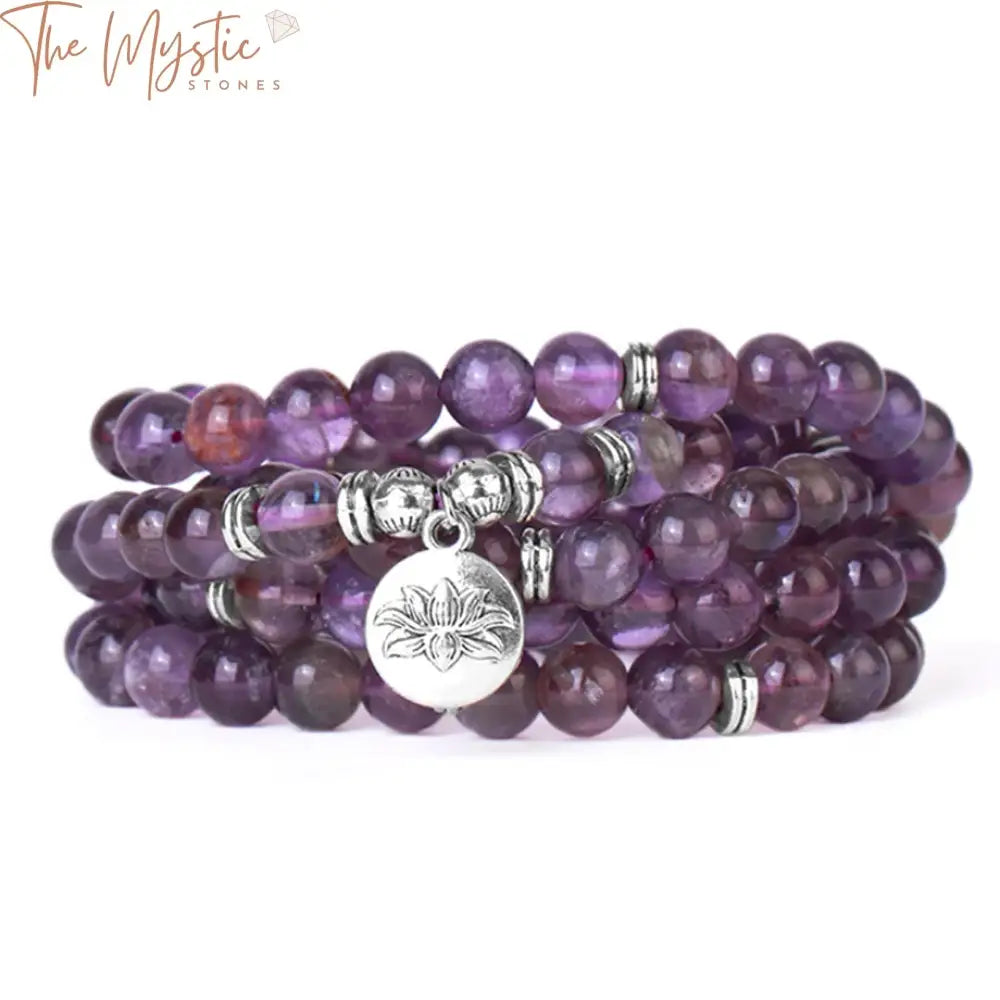 A multilayer wrap bracelet featuring 108 natural gemstone beads in a variety of earthy tones.