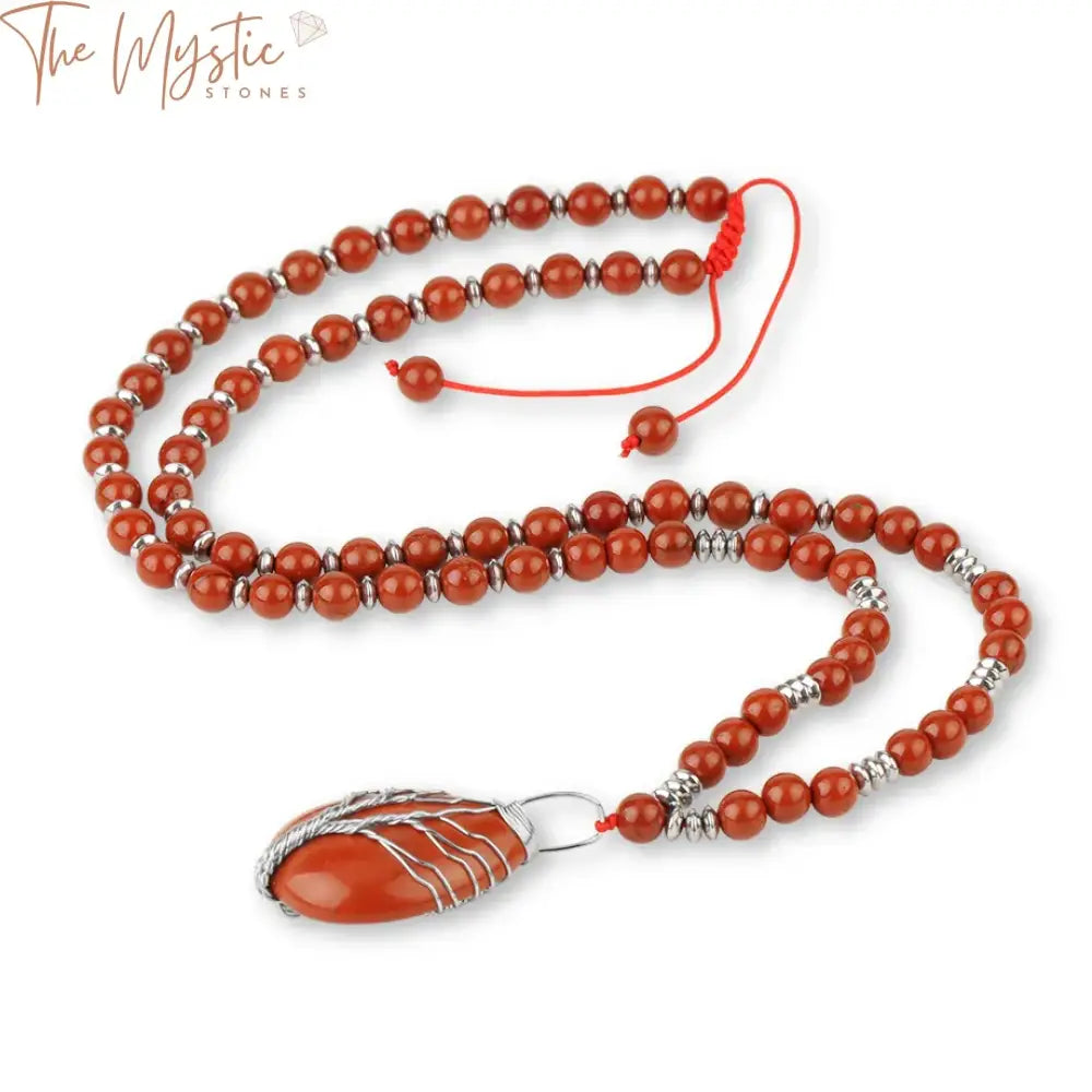 A natural gemstone necklace featuring red jasper stones is displayed.