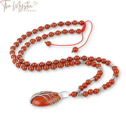 A natural gemstone necklace featuring red jasper stones is displayed.