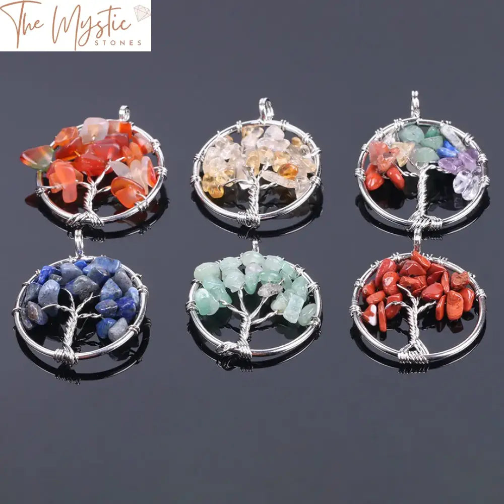 A Tree of Life necklace featuring a silver-colored pendant intricately wire-wrapped with natural gemstone chip beads.