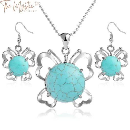 A jewelry set featuring turquoise stones, including a pendant necklace and dangle earrings.