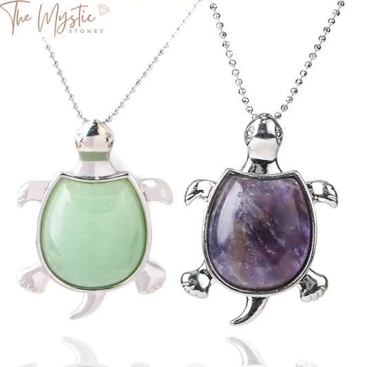 A collection of Natural Stone Tortoise Pendant Necklaces displayed neatly.