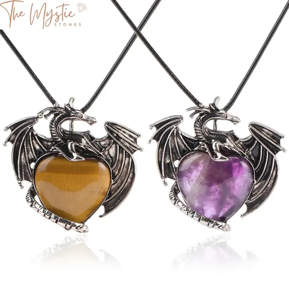 A vintage-style necklace featuring a dragon-shaped pendant enveloping a polished heart-shaped tiger eye crystal.