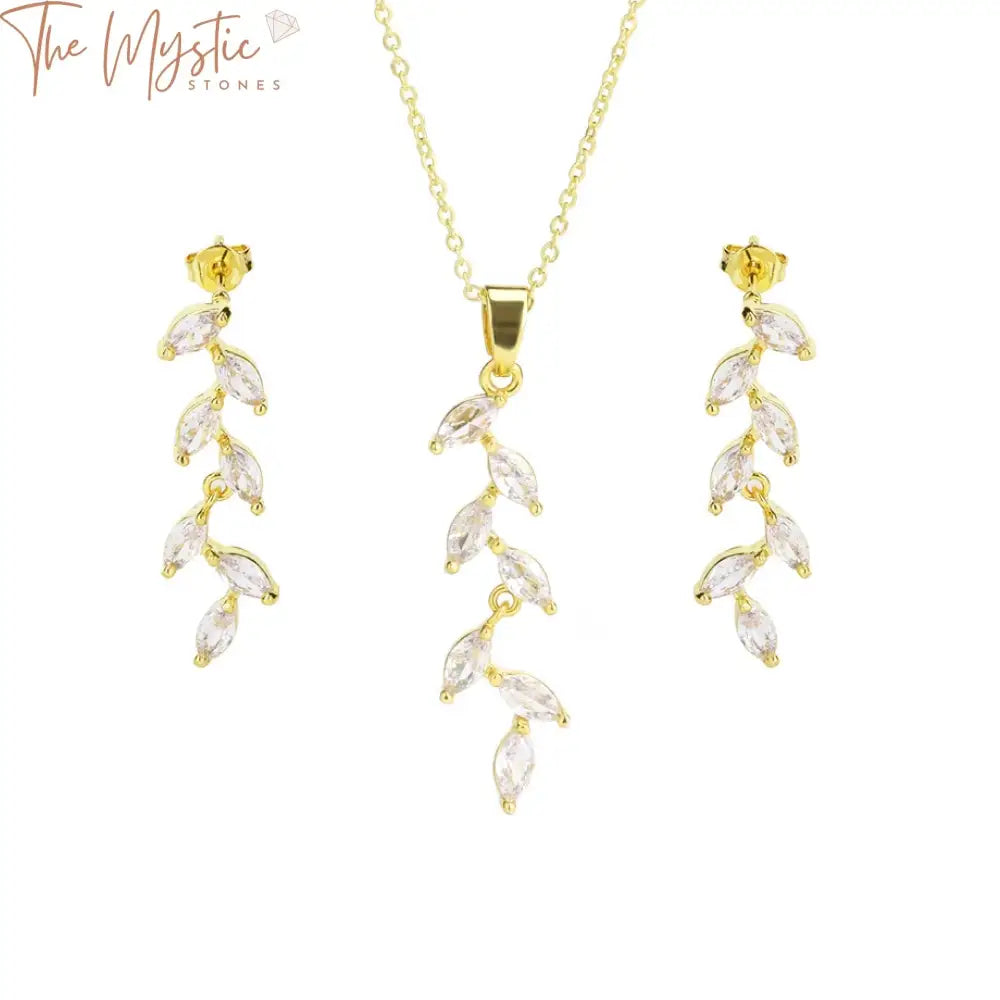 A trendy women's jewelry set featuring a wheat crystal pendant necklace and luxury gold and silver color stud earrings.