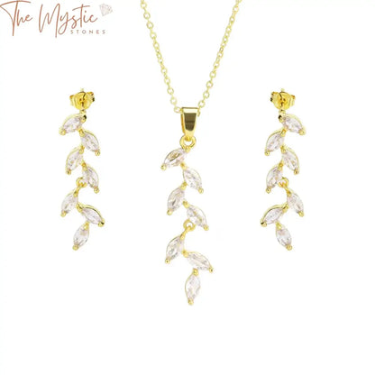 A trendy women's jewelry set featuring a wheat crystal pendant necklace and luxury gold and silver color stud earrings.