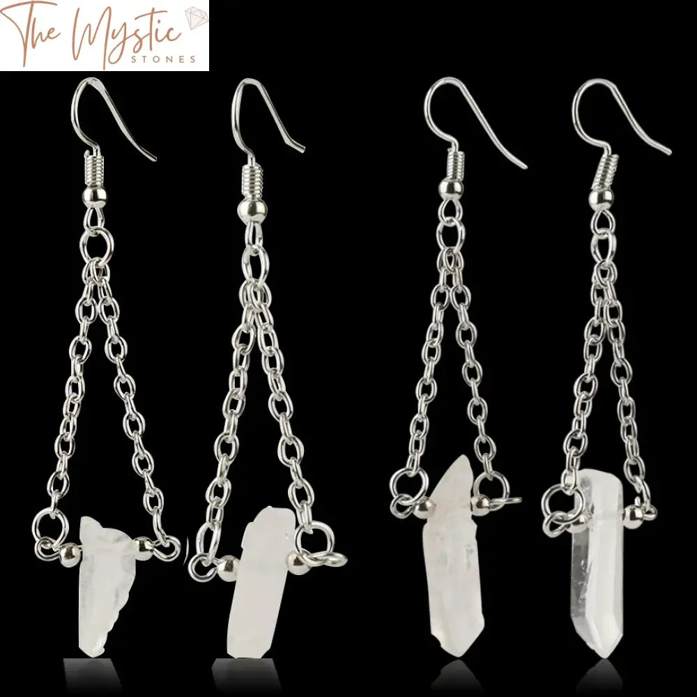 A pair of elegant earrings featuring natural white crystal stones in a distinctive drop shape.