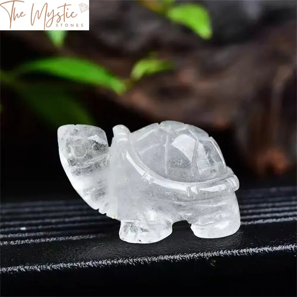 A 1.5-inch hand-carved tortoise figurine made from natural white crystal quartz.