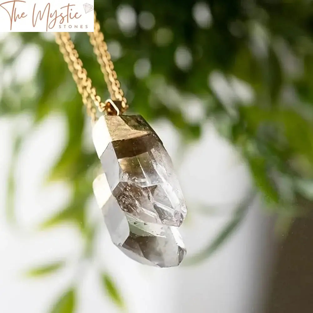 A single handmade pendant featuring a natural white crystal quartz point.