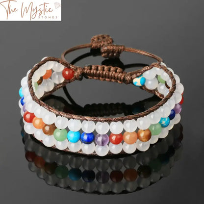 A close-up image showcases a bohemian-style wrap bracelet made from natural stones.